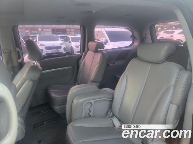 Kia Canival 2013 — photo 10
