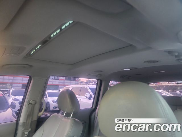 Kia Canival 2013 — photo 11