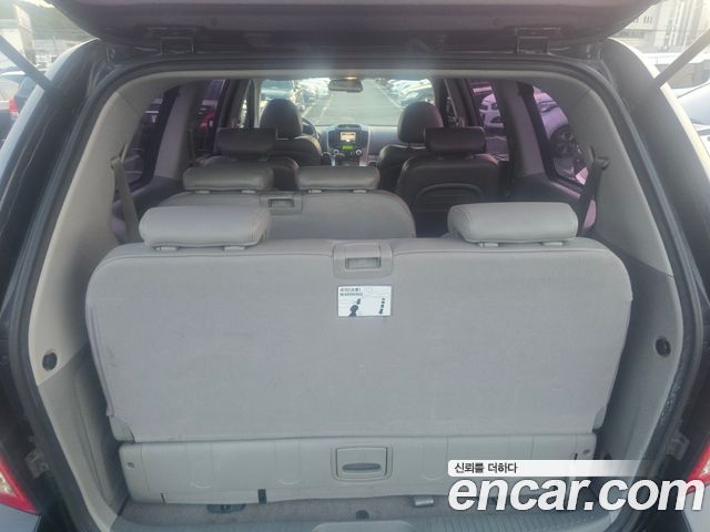 Kia Canival 2013 — photo 12