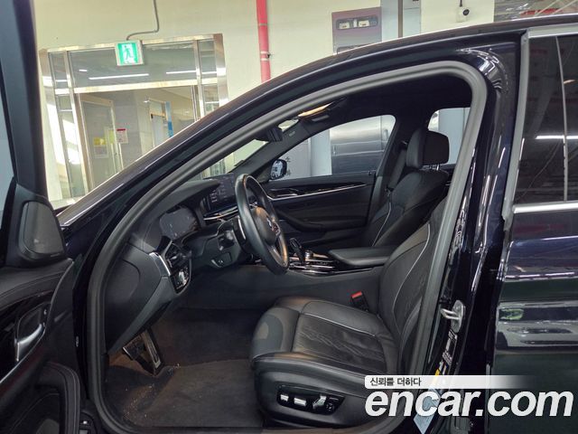 BMW 5-Series 2023 — photo 7