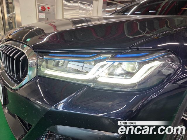 BMW 5-Series 2023 — photo 16
