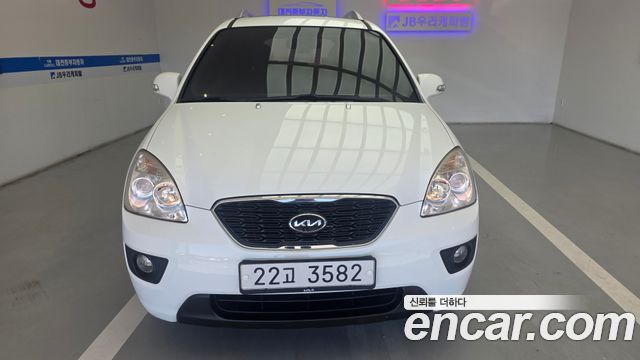 Kia Carens 2011 — photo 1