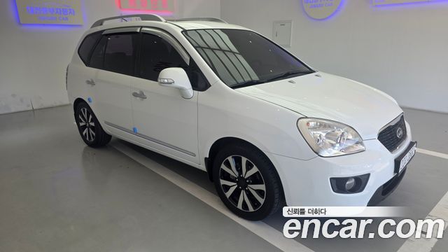 Kia Carens 2011 — photo 2
