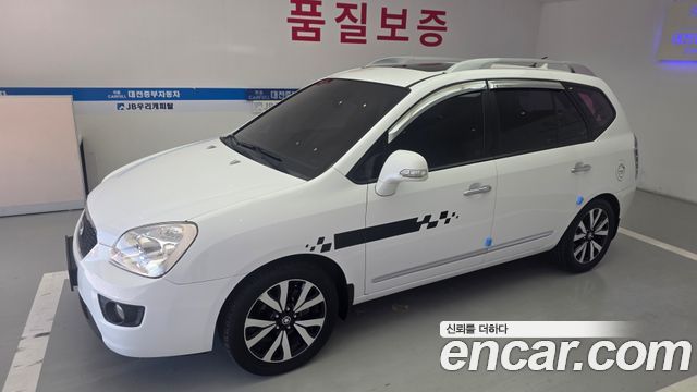 Kia Carens 2011 — photo 3