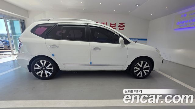 Kia Carens 2011 — photo 4