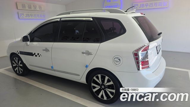 Kia Carens 2011 — photo 7