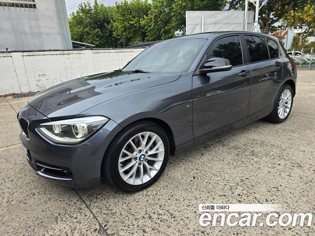 BMW 1-Series 2015 — photo 1