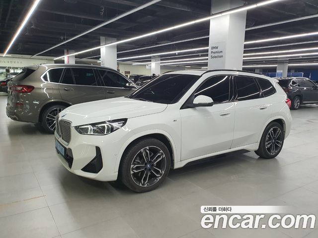 BMW iX1 2025 — photo 1