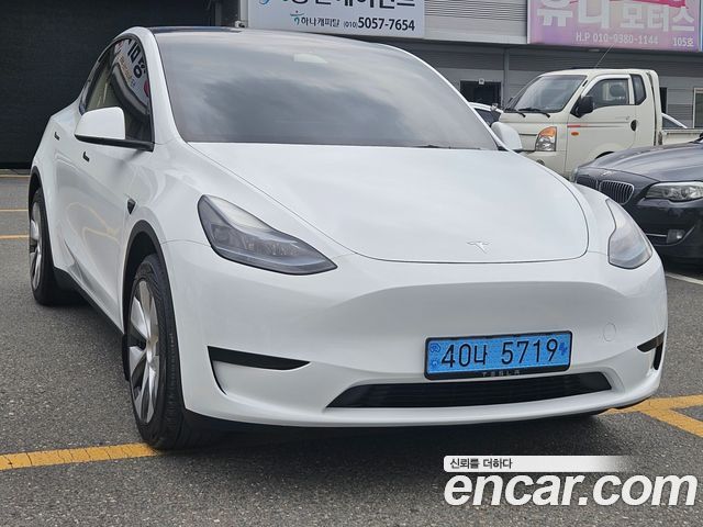 Tesla Model Y 2024 — photo 2