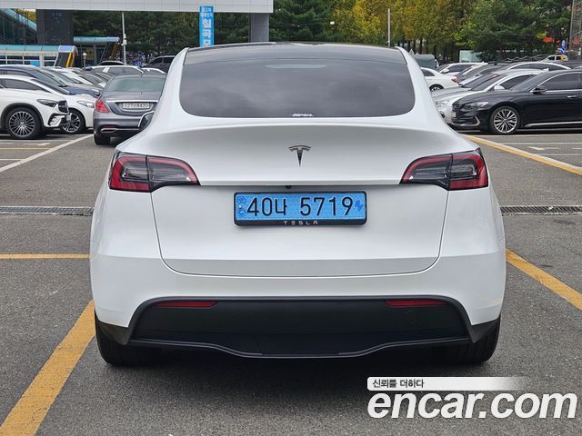 Tesla Model Y 2024 — photo 4