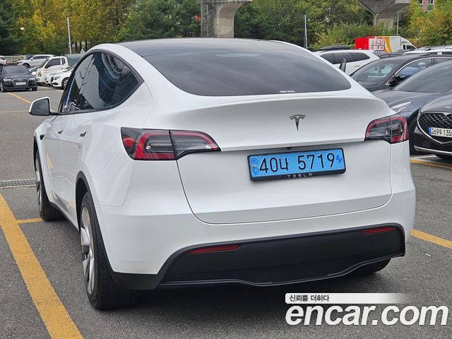 Tesla Model Y 2024 — photo 5