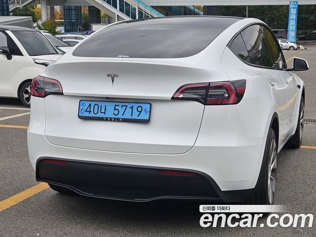 Tesla Model Y 2024 — photo 6