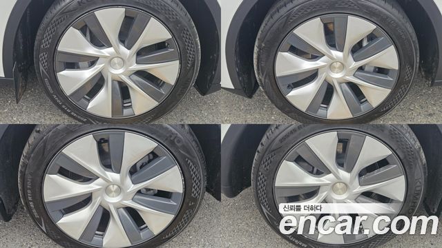 Tesla Model Y 2024 — photo 20