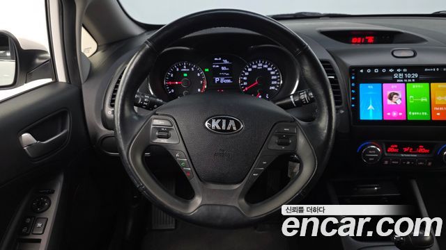 Kia K3 2015 — photo 19