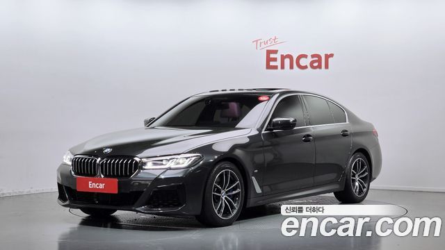 BMW 5-Series 2022 — photo 1