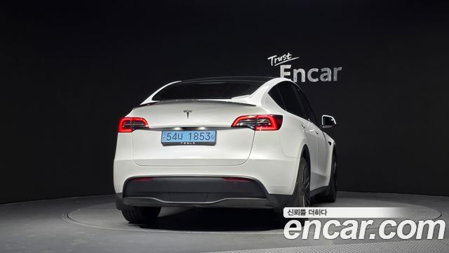 Tesla Model Y 2024 — photo 4