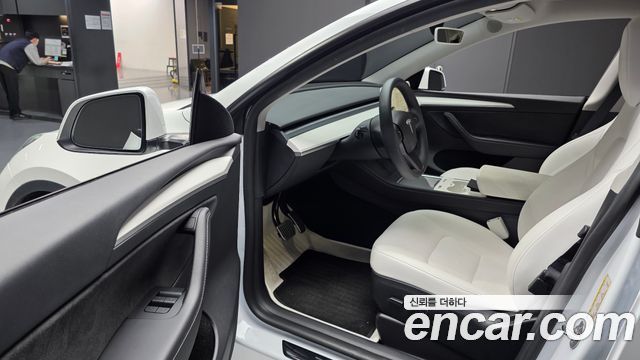 Tesla Model Y 2024 — photo 13