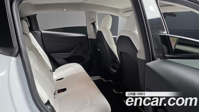 Tesla Model Y 2024 — photo 17
