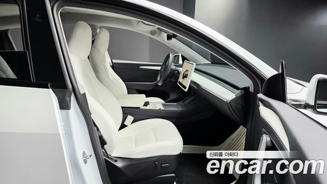 Tesla Model Y 2024 — photo 18