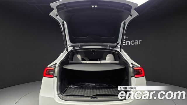 Tesla Model Y 2024 — photo 25