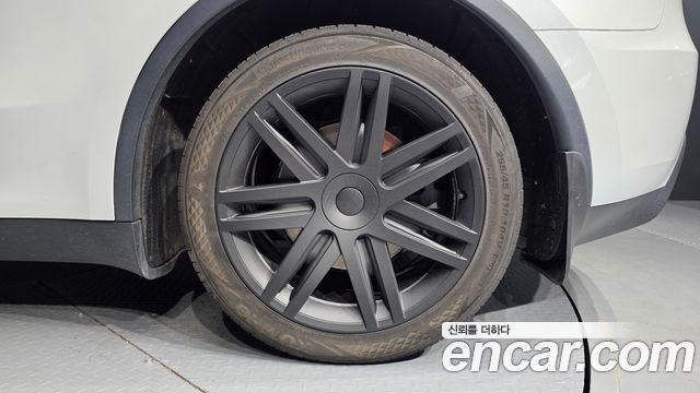 Tesla Model Y 2024 — photo 7