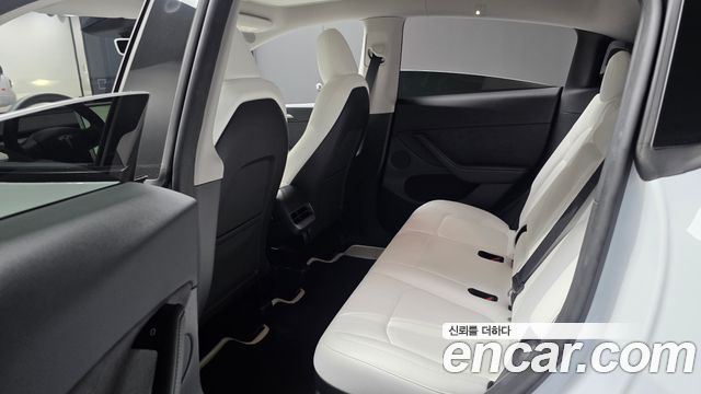 Tesla Model Y 2024 — photo 16