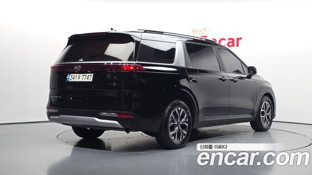 Kia Canival 2021 — photo 2