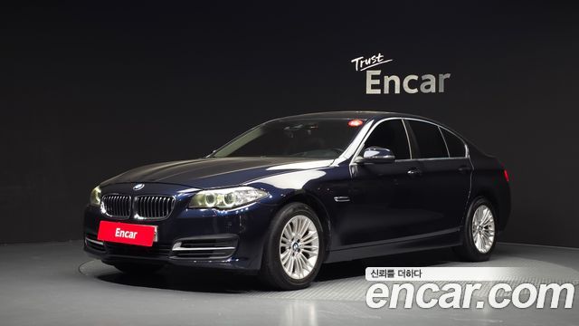 BMW 5-Series 2015 — photo 1