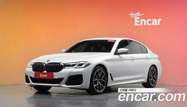 BMW 5-Series 2023 — photo 1