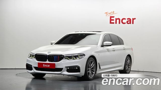 BMW 5-Series 2018 — photo 1