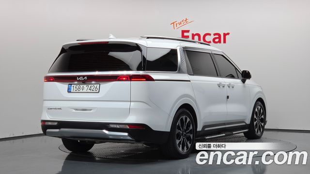 Kia Canival 2021 — photo 2