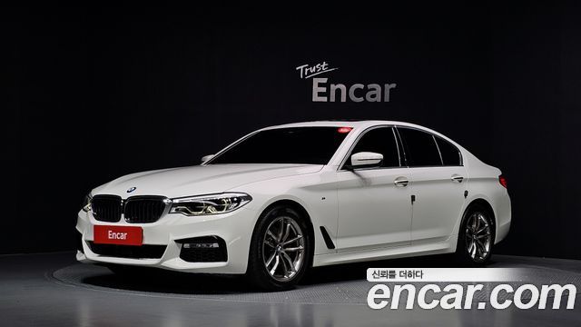 BMW 5-Series 2018 — photo 1