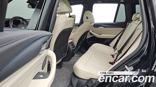 BMW iX3 2025 — photo 12