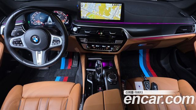 BMW 5-Series 2023 — photo 10