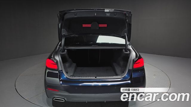BMW 5-Series 2023 — photo 24