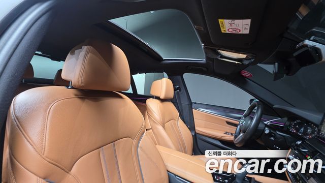 BMW 5-Series 2023 — photo 26