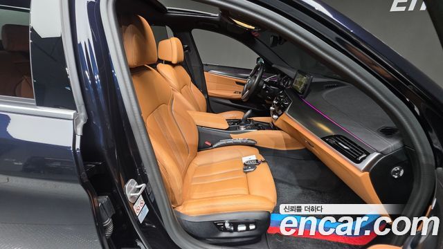 BMW 5-Series 2023 — photo 16