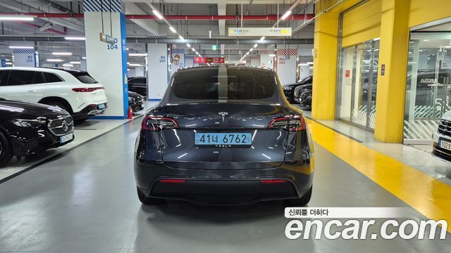 Tesla Model Y 2024 — photo 2