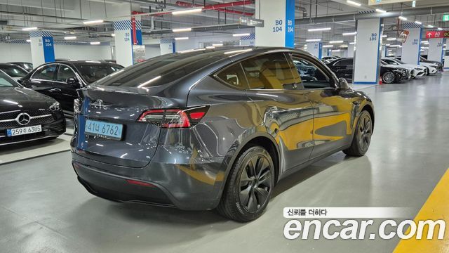 Tesla Model Y 2024 — photo 4