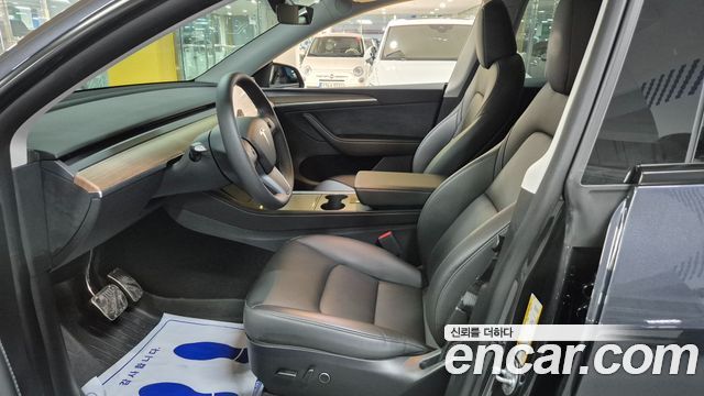 Tesla Model Y 2024 — photo 10