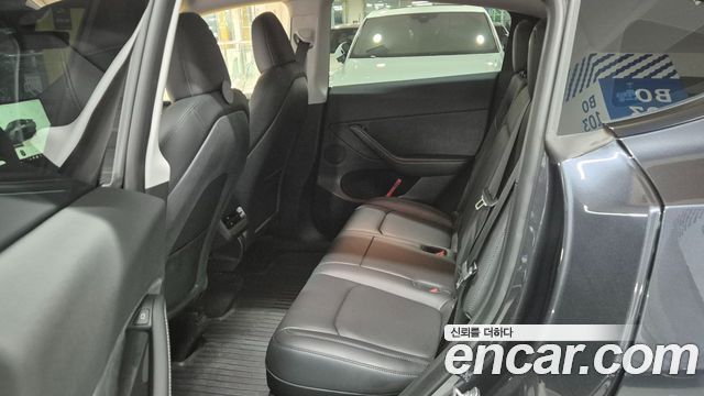 Tesla Model Y 2024 — photo 13