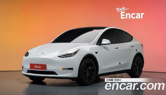 Tesla Model Y 2022 — photo 1