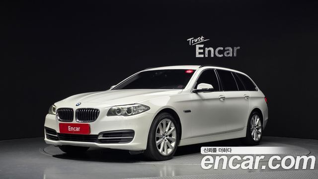 BMW 5-Series 2015 — photo 1