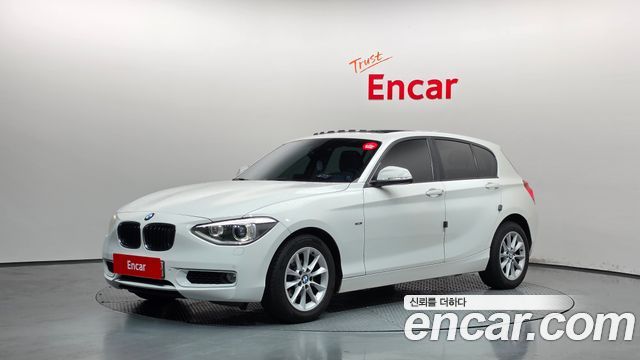 BMW 1-Series 2014 — photo 1