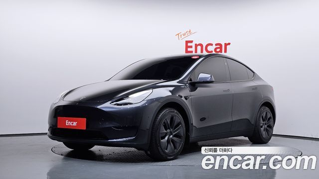 Tesla Model Y 2024 — photo 1