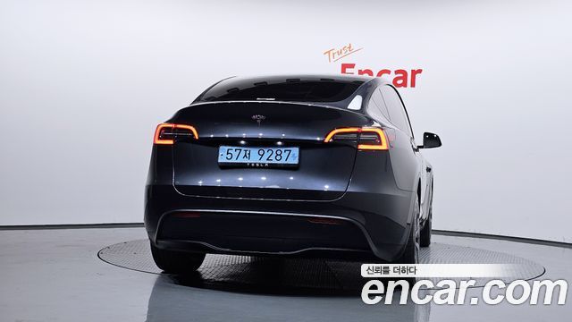 Tesla Model Y 2024 — photo 4