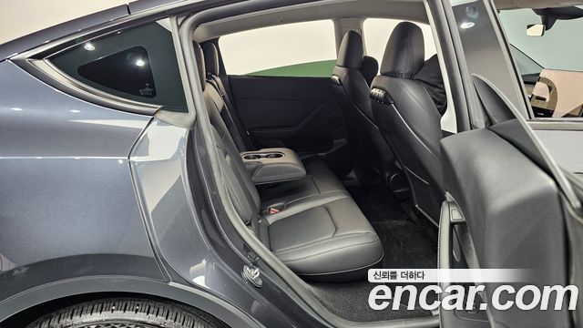Tesla Model Y 2024 — photo 17