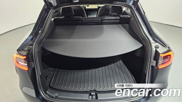 Tesla Model Y 2024 — photo 25