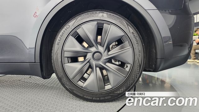 Tesla Model Y 2024 — photo 7