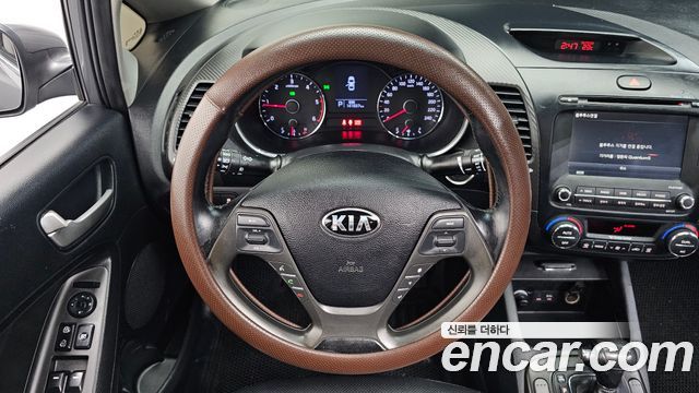 Kia K3 2014 — photo 19